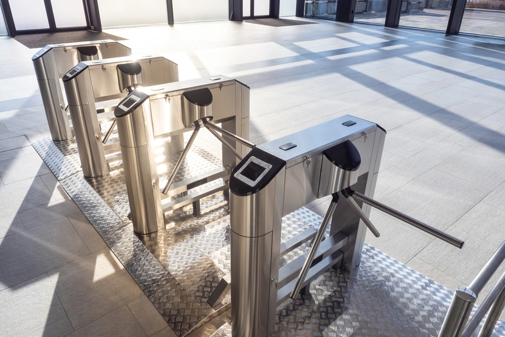 Ecamsecurity Turnstile Access Control Installation Turnstile access control system in a modern facility, illustrating Ecamsecurity’s secure entry solutions.